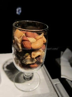 a glass full of nuts