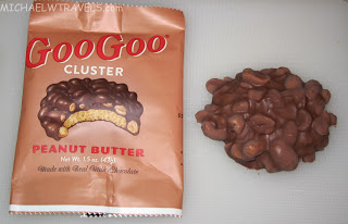 a chocolate covered peanut butter and a bag of nuts