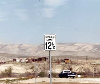 a speed limit sign in the desert