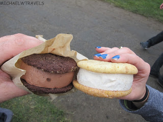 two hands holding ice cream sandwiches