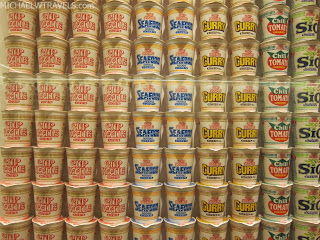 a wall of food containers