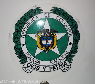 a green and white logo