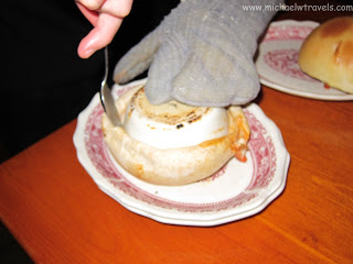 a person putting food on a plate