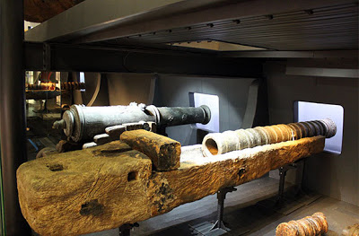 a large old cannon on display