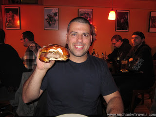 a man holding a burger
