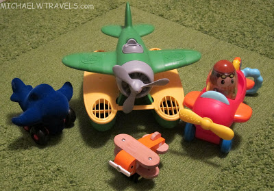 a group of toys on a green surface