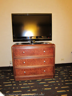 a television on a dresser