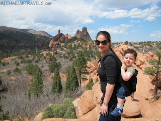 a woman and child on a rocky mountain