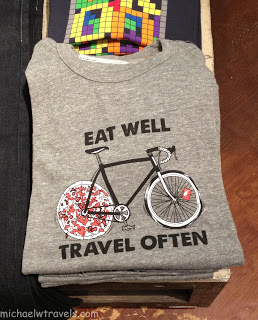 a grey shirt with a bike on it