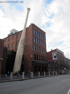 a large baseball bat on the side of Louisville Slugger Museum & Factory
