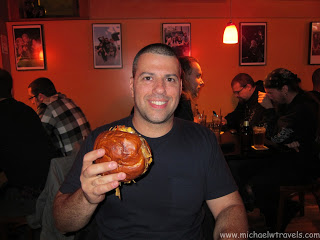 a man holding a burger